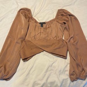 Burnt orange silky top with tie in back